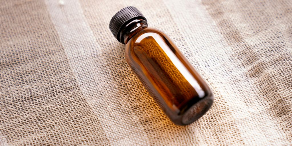 a brown bottle sitting on top of a table