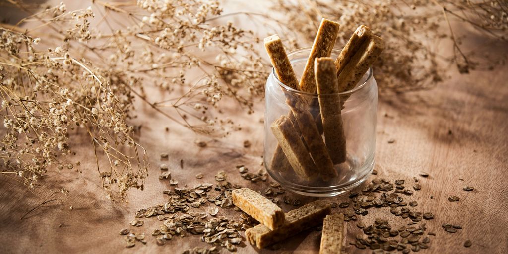 brown wooden sticks on clear glass container